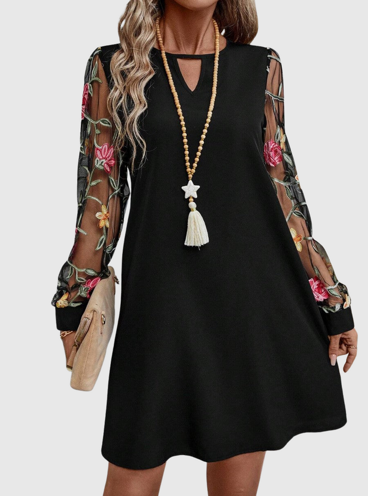 Zuzana | Elegantní šaty s výstřihem do V a výraznými rukávy