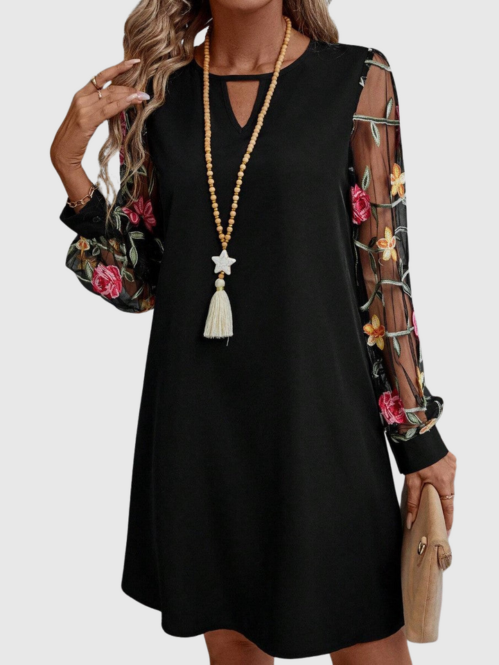 Zuzana | Elegantní šaty s výstřihem do V a výraznými rukávy